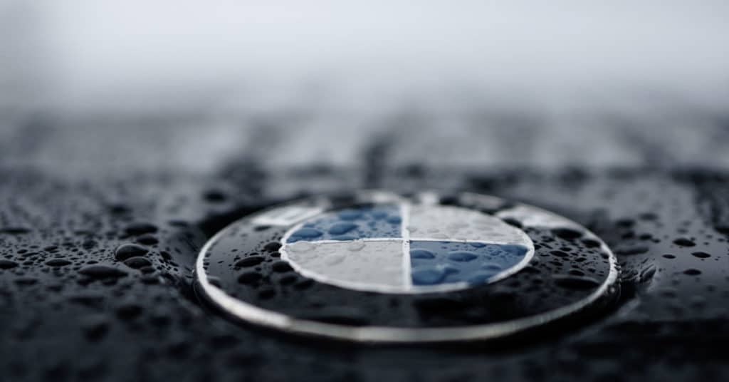 Rain drops on hood of BMW. | Fatal Crash