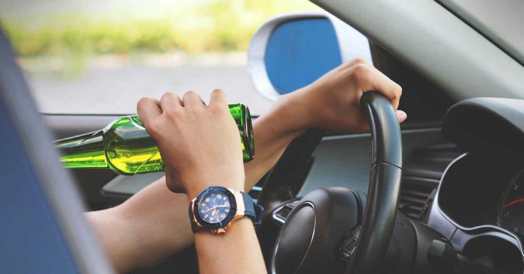 person drinking beer while driving vehicle | New PA DUI laws