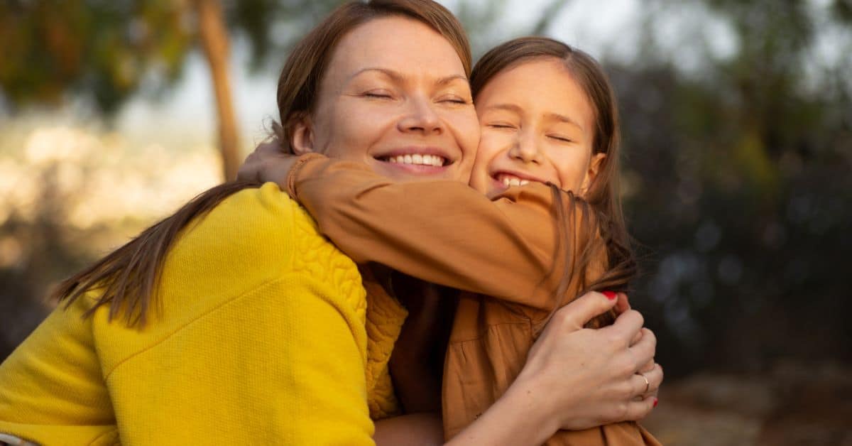 Adult woman hugging a young girl, Creating an Estate Plan in 2025