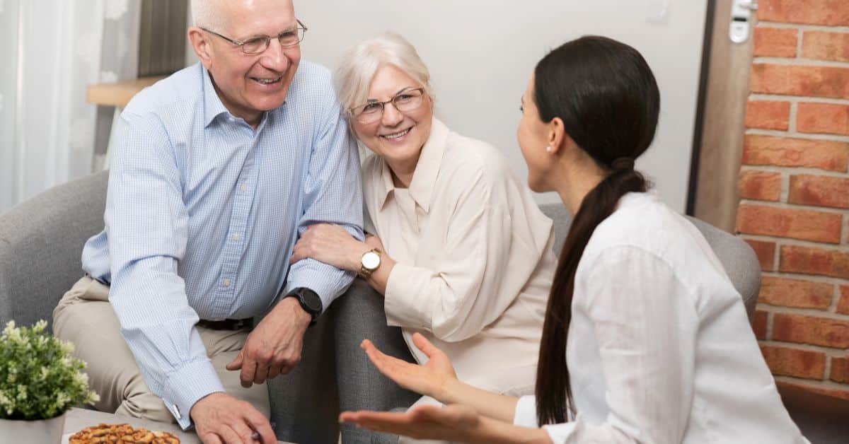 Smiling man and woman talking to an estate planning lawyer, Creating an Estate Plan in 2025